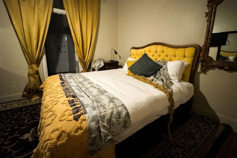 King hotel suite with plush furnishings at Club Boutique Hotel Cunnamulla